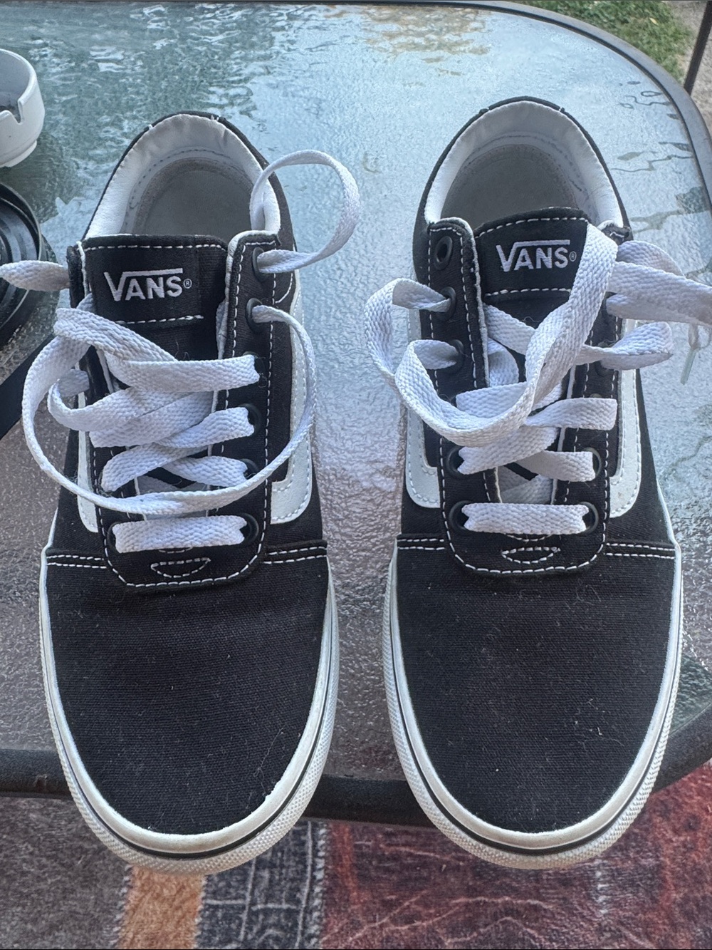 Vans Kids Black and White Low-Top Skate Sneakers.